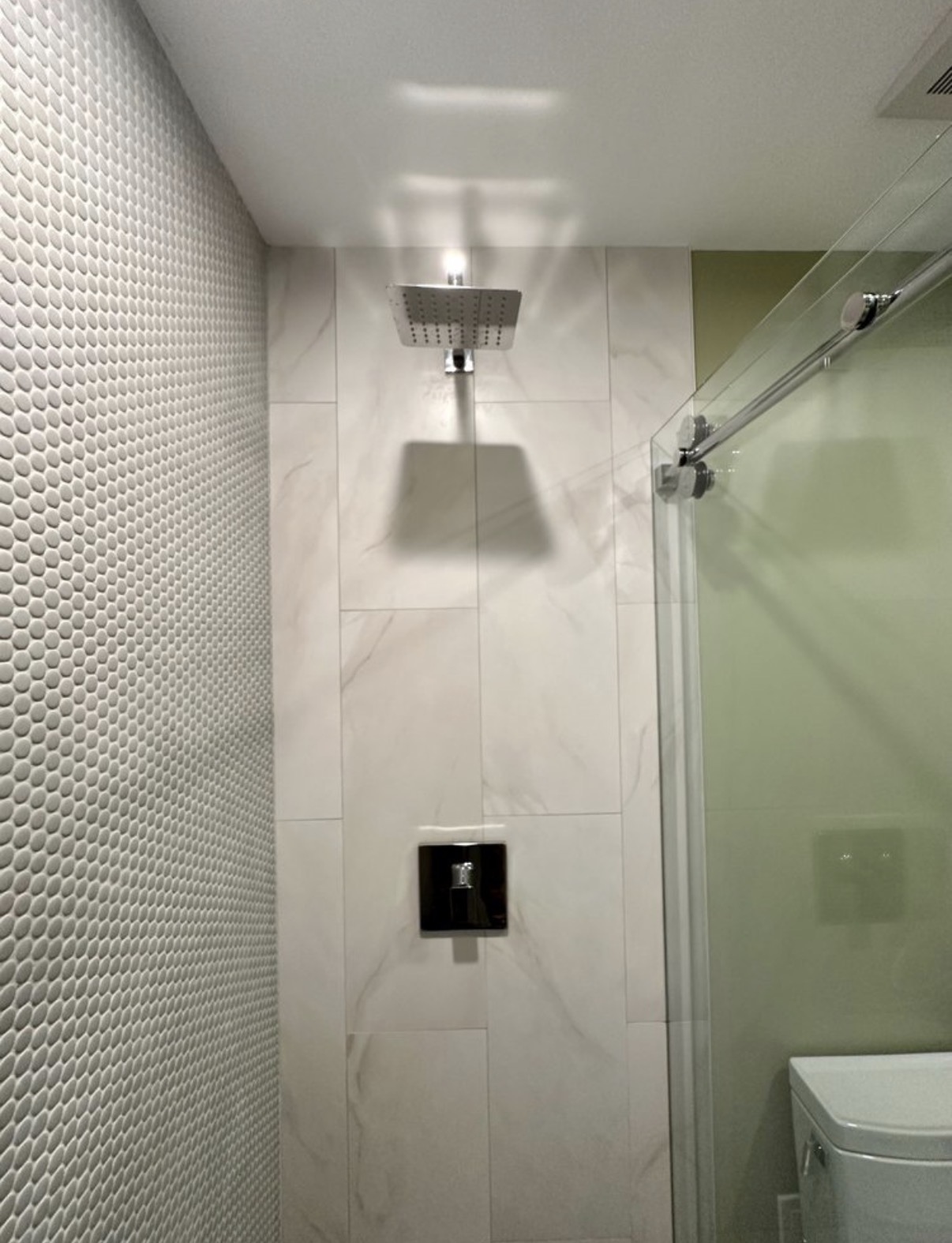 Marble shower with rainfall head