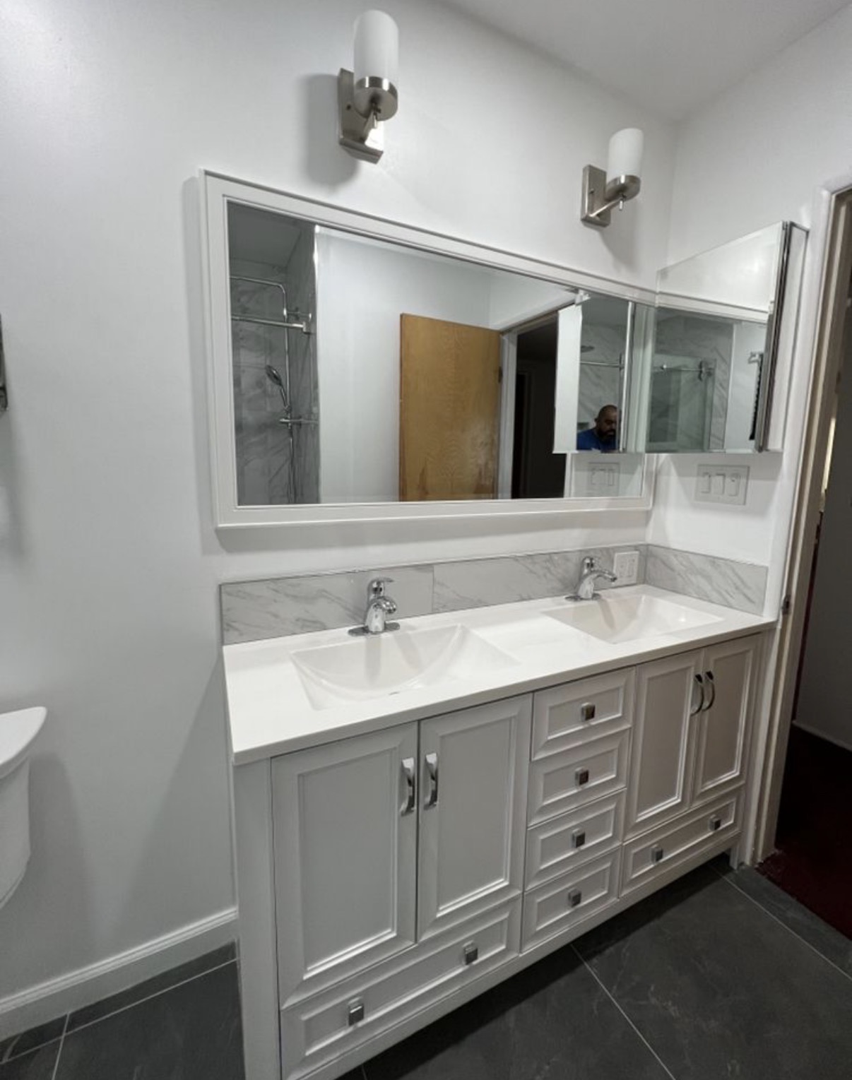 Double-vanity bathroom with custom mirror